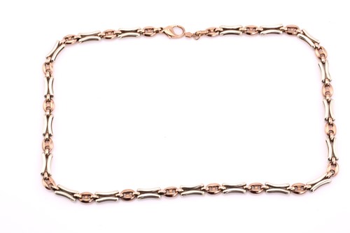 Lot 88 - A 9ct bi-coloured gold fancy link necklace,...