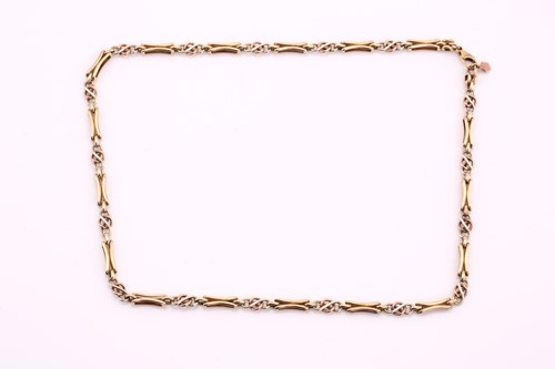 Lot 101 - A 9ct gold tri-coloured fancy link necklace,...