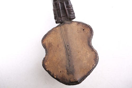 Lot 177 - An anthropomorphic african bow harp,...