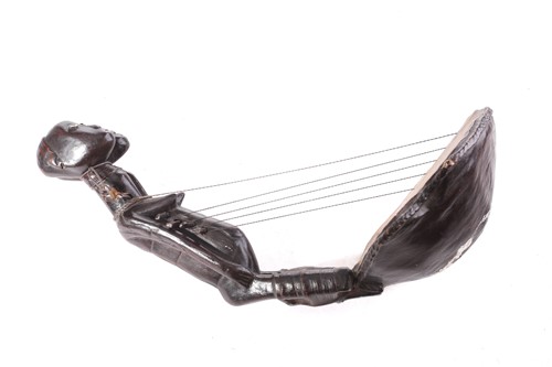 Lot 177 - An anthropomorphic african bow harp,...