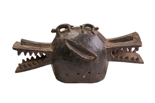 Lot 194 - A Senufo Janus 'Firespitter' helmet mask,...