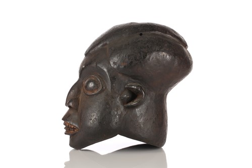 Lot 30 - A Bamileke helmet mask, Cameroon, with an...