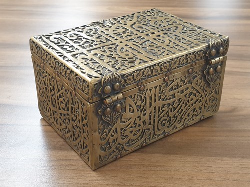 Lot 196 - An Indo Persian style rectangular brass and...