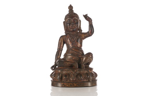 Lot 194 - A n Indian gilt-bronze figure of Milarepa (?)...