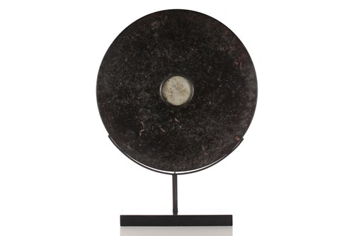 Lot 141 - A large Tibetan style hardstone Bi disk with...
