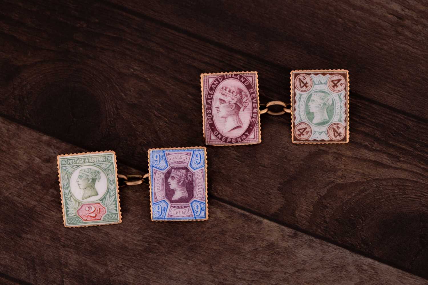 Lot 174 - A pair of rose gold and enamel postage stamp...