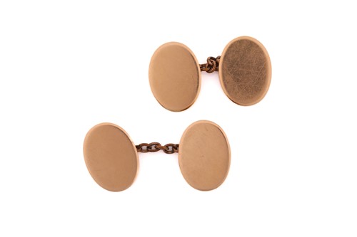 Lot 57 - A pair of 15ct gold oval cufflinks, each...