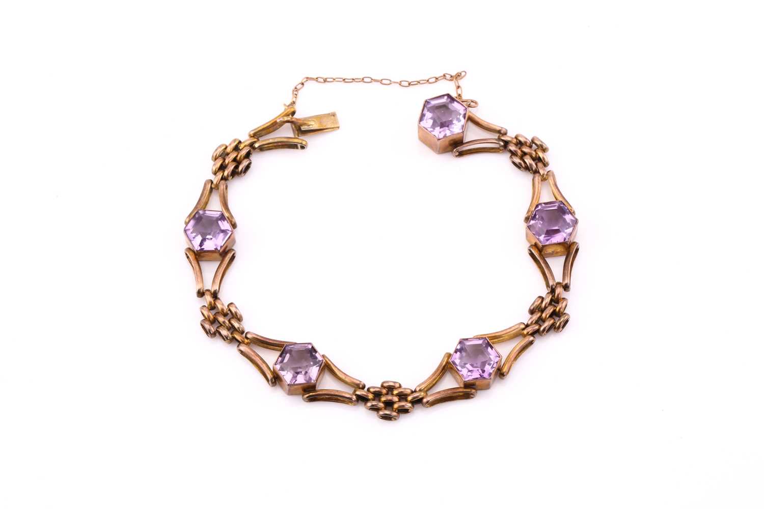 Lot 339 - An Edwardian 9ct gold amethyst bracelet,...