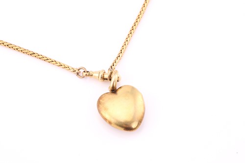 Lot 110 - A diamond set heart-shaped locket and chain,...