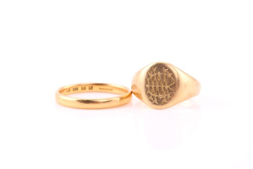 Lot 64 - A set of gold signet ring and wedding band,...