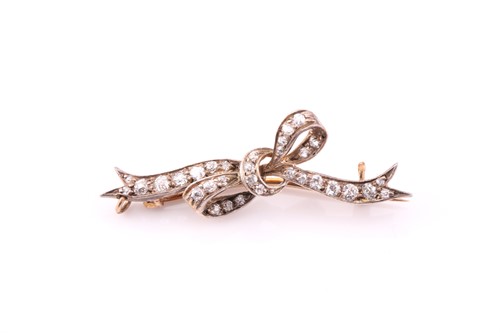 Lot 28 - A late 19th century diamond bow brooch, the...