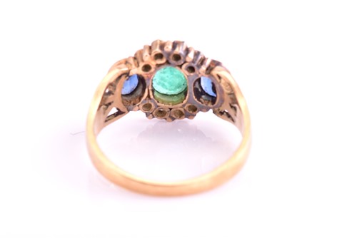 Lot 7 - An Emerald and Sapphire dress ring, consisting...