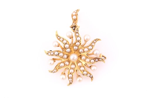 Lot 37 - A Victorian yellow metal seed pearl starburst...