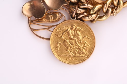 Lot 445 - A yellow gold charm bracelet, consisting of...