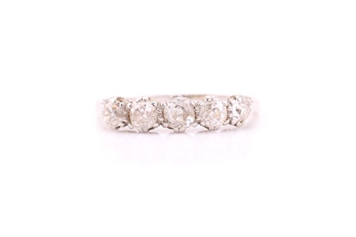 Lot 68A - A five stone half hoop diamond ring, the...