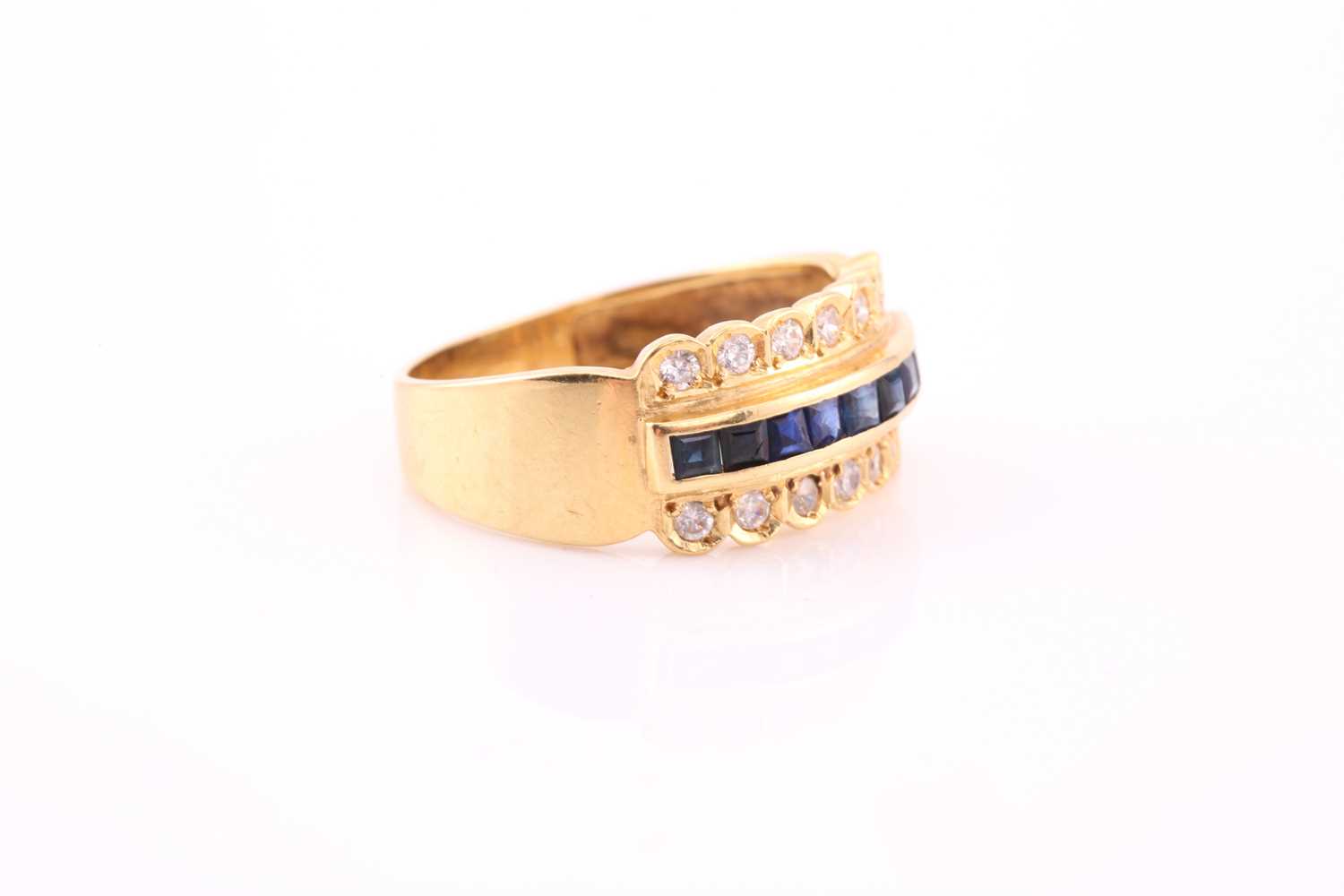 Lot 41 - A yellow metal, diamond, and sapphire ring,...