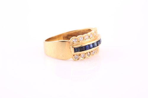 Lot 41 - A yellow metal, diamond, and sapphire ring,...