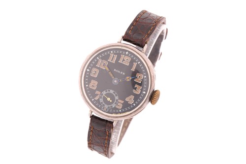 Lot 350 - A silver Rolex trench watch circa 1914, with a...