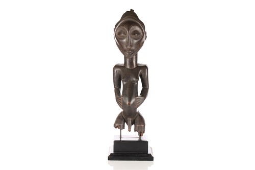 Lot 185 - A Hemba standing figure of a male, Democratic...