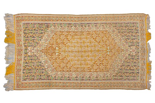 Lot 422 - An ochre ground Turkish silk Kelim rug with a...