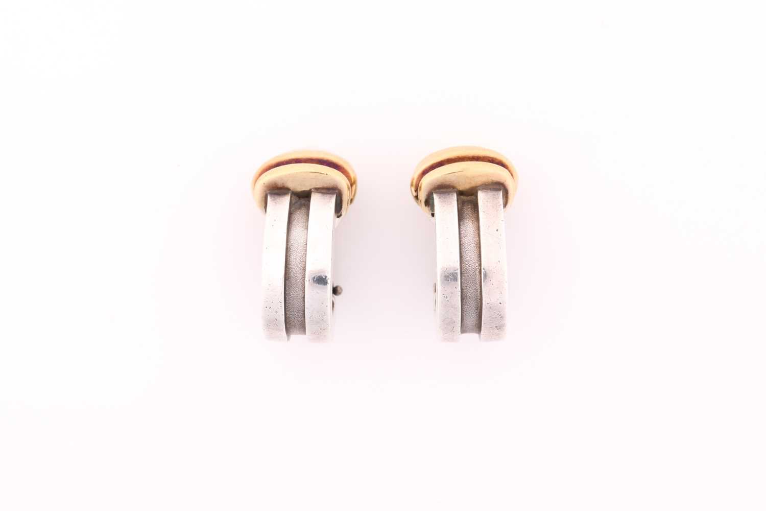 Lot 97 - A pair of Tiffany & Co. Atlas groove ear clips,...