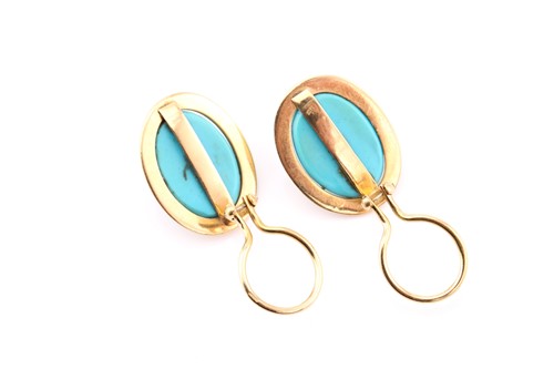 Lot 16 - A pair of turquoise ear clips, each consisting...