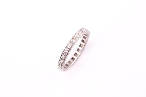 Lot 91 - An Art Deco diamond eternity ring, consisting...