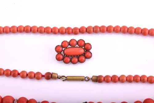 Lot 67 - A lot consisting of a coral necklace, a coral...