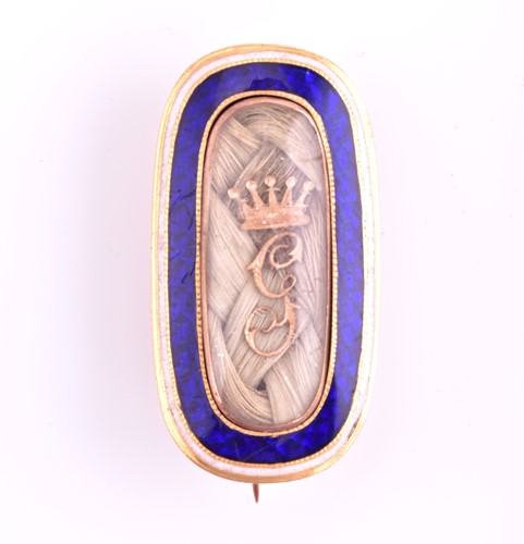 Lot 261 - A late 19th century mourning brooch, the gold...