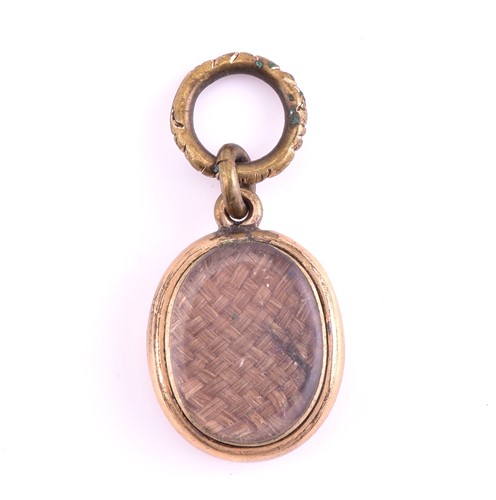 Lot 261 - A late 19th century mourning brooch, the gold...