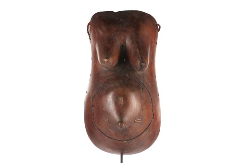 Lot 65 - A Makonde female body mask, Tanzania, the...
