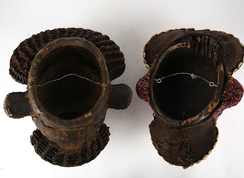 Lot 107 - Two Bamileke Kam masks, Cameroon, one adorned...