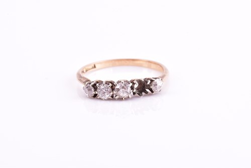 Lot 183 - A four diamond ring, each round brilliant cut...