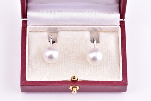Lot 69 - Pair of South Sea pearl earrings, white 12mm...