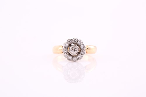 Lot 156 - A diamond cluster ring, central diamond within...