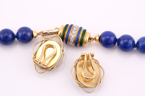 Lot 262 - A lapis lazuli bead necklace, with yellow...