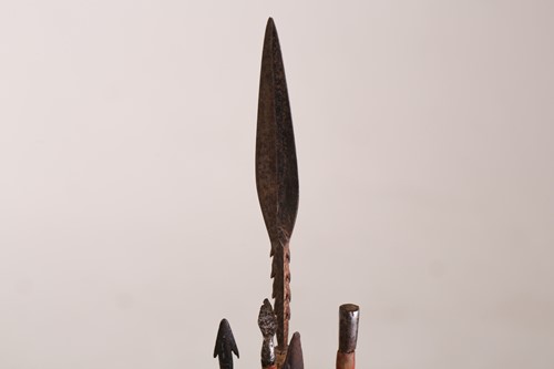 Lot 120 - A West African split cane shield, with hide...