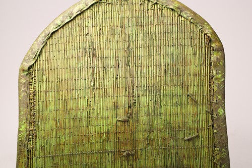 Lot 120 - A West African split cane shield, with hide...