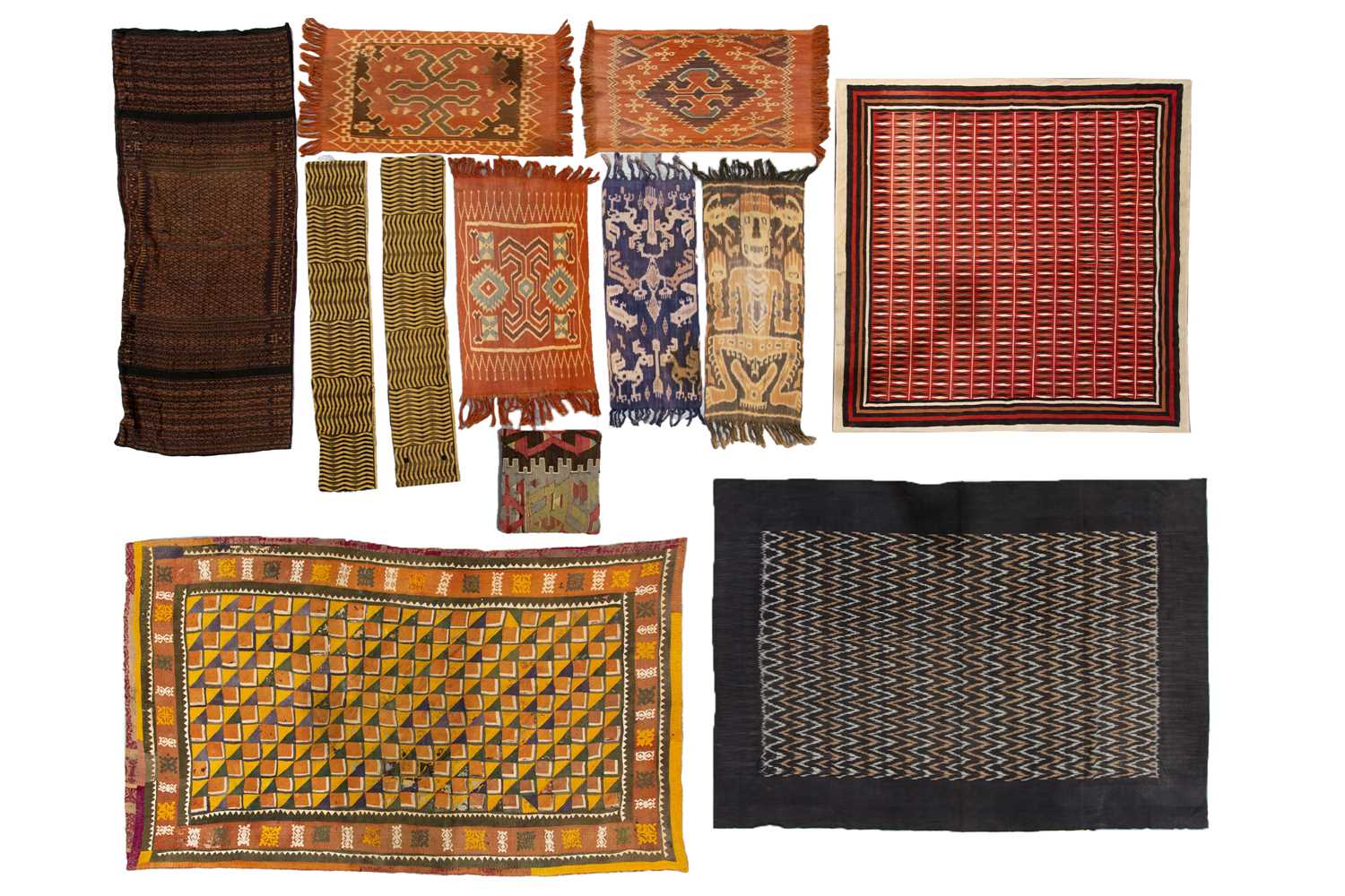 Lot 101 - A collection of 12 African, Indonesian, and...