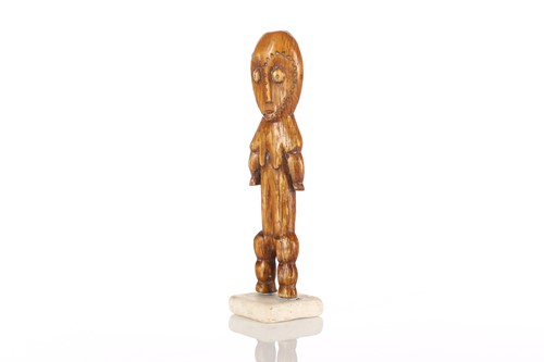 Lot 71 - A Lega carved ivory standing female figure,...