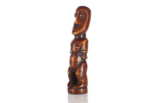 Lot 37 - A Lega carved ivory standing female figure,...