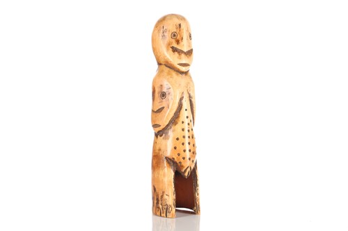 Lot 134 - A Lega carved ivory standing female figure,...