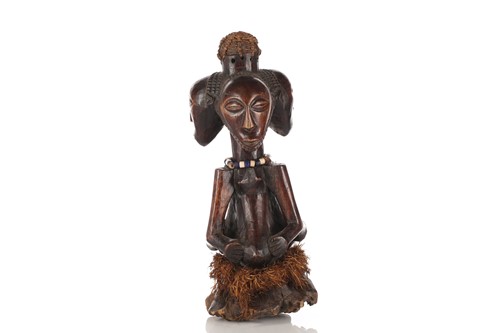 Lot 135 - A Hemba triple-headed power figure, Democratic...