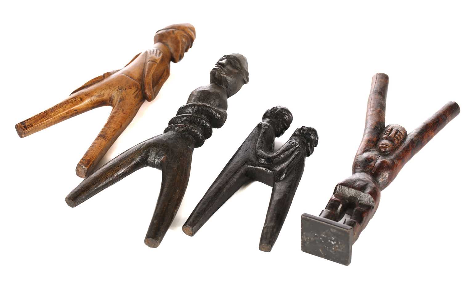Lot 57 - Four West African anthropomorphic sling shots,...