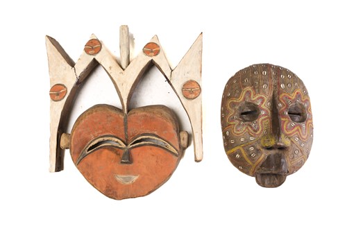 Lot 208 - A Kwele Beete mask, Gabon, painted in orange,...