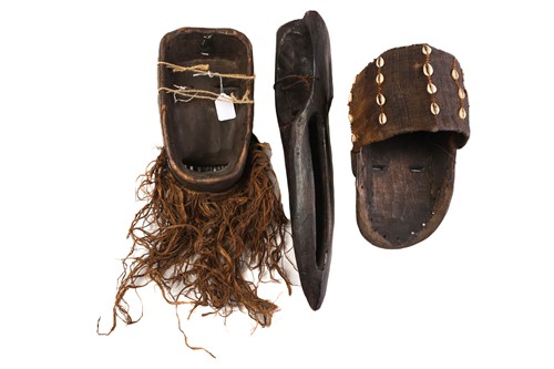 Lot 118 - A We mask, Ivory Coast, with applied shells,...