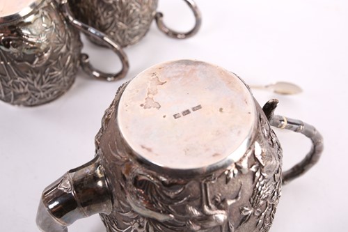 Lot 228 - A Chinese three piece silver teaset by Wang...