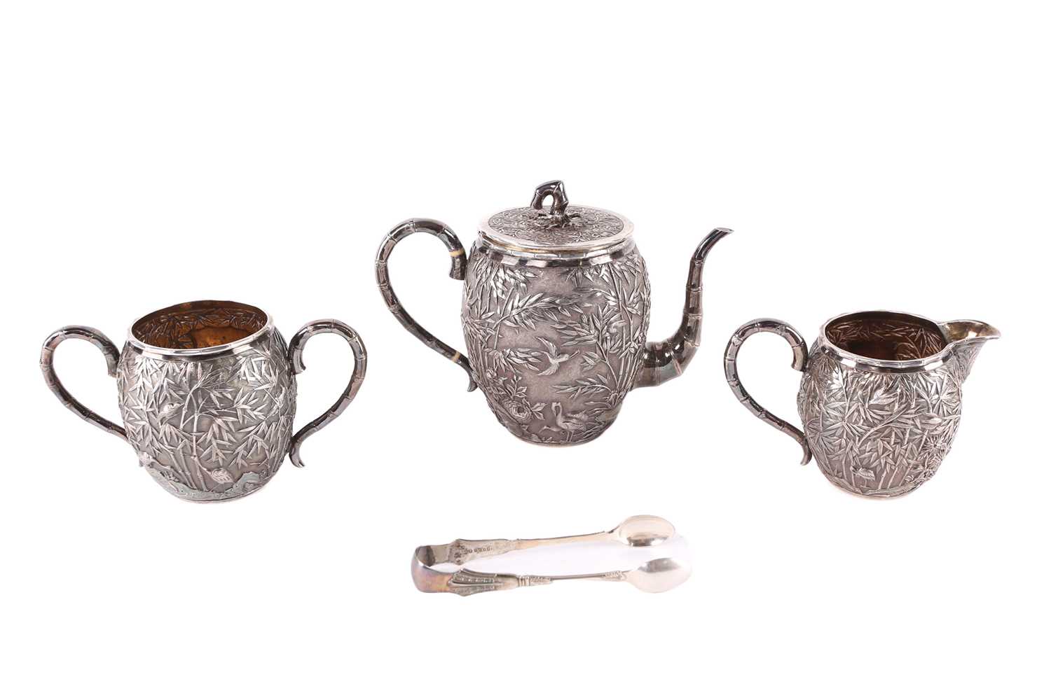 Lot 228 - A Chinese three piece silver teaset by Wang...