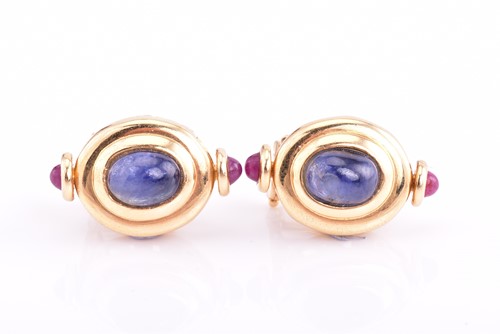 Lot 184 - A pair of sapphire and ruby earrings, the oval...
