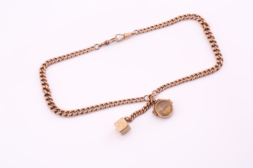 Lot 180 - A 9ct rose gold watch chain, the uniform...